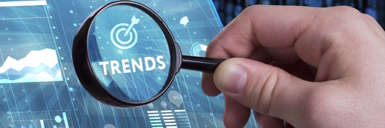 Mobile-Payment-Trends-Kount-2018 magnifying glass looking at graphs