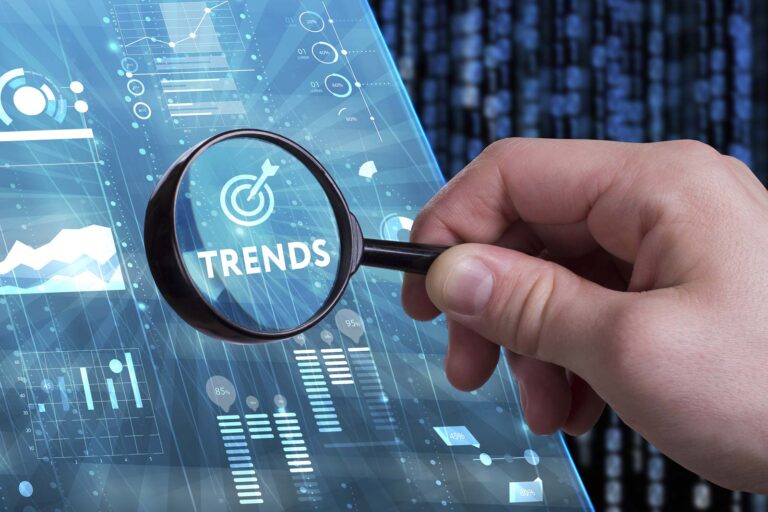 Mobile-Payment-Trends-Kount-2018 magnifying glass looking at graphs